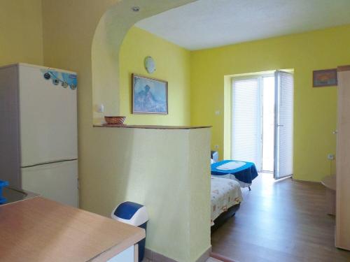 Postel nebo postele na pokoji v ubytování Apartment Nedo