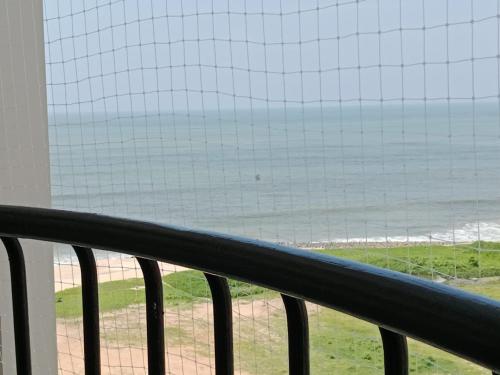 a view of the beach from a balcony at Seashells Pentagon Calicutbeach in Kozhikode