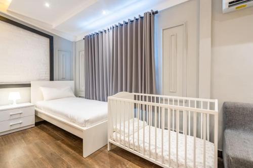 Ένα ή περισσότερα κρεβάτια σε δωμάτιο στο Luxury Villa Belvedere Bali in Seminyak