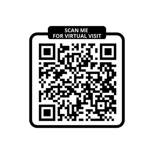 un code qr noir et blanc avec un signe me scanner pour illustrer une visite virtuelle dans l'établissement 306 Suite Tigre - Superbe Appartement à Paris, à Paris
