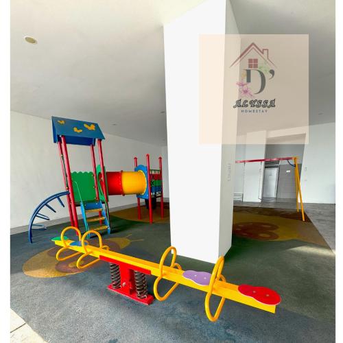 a childrens play area with a colorful playground at D' Alyssa Homestay Perda in Bukit Mertajam