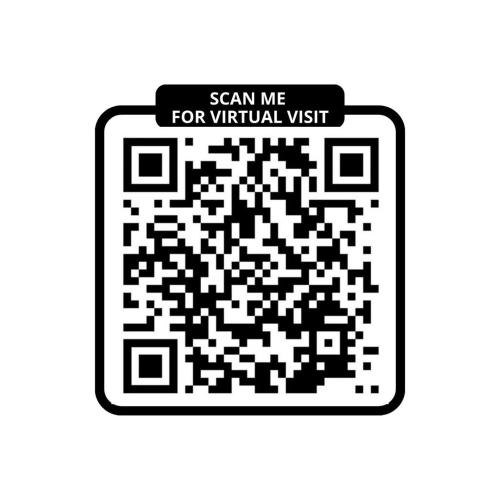 un code qr noir et blanc avec un signe me scanner pour illustrer une visite virtuelle dans l'établissement 140 Suite Ludo - Superbe Appartement à Paris, à Paris