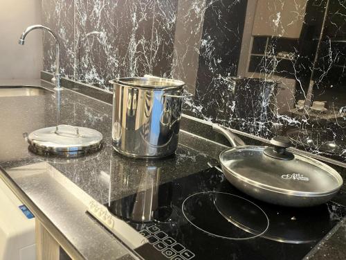 Ένα μπάνιο στο Private sea view apartment at Mida Grande Resort