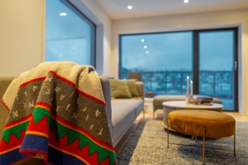 พื้นที่นั่งเล่นของ Northern Light Apartments - Nyholmen Luxury Penthouse B