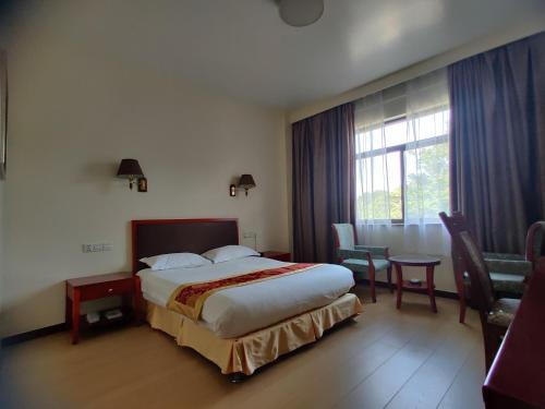 Katil atau katil-katil dalam bilik di Soluxe Club International Hotel