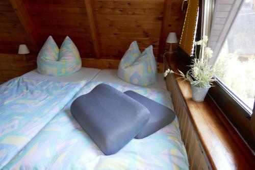 Postel nebo postele na pokoji v ubytování Reetdachhaus in Quilitz auf Usedom
