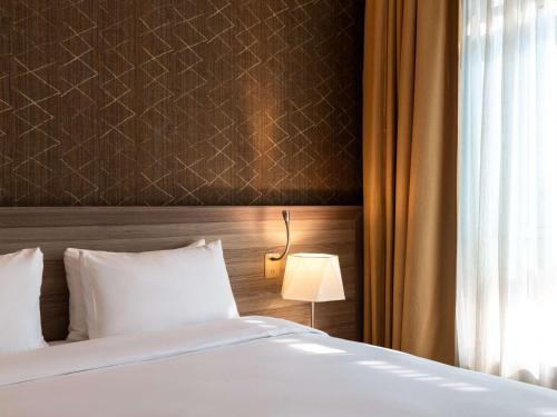 Mercure Makkah Aziziahにあるベッド