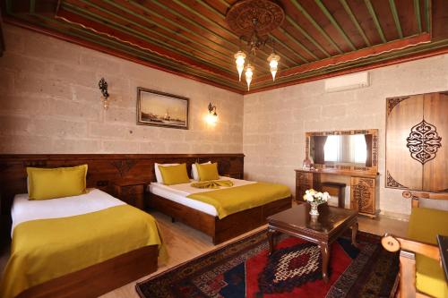 Cama o camas de una habitación en Cappadocia Inn Cave Hotel
