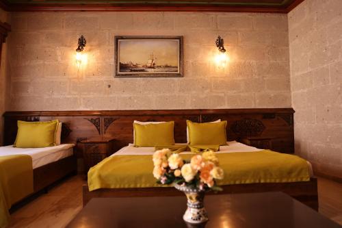 Cama o camas de una habitación en Cappadocia Inn Cave Hotel
