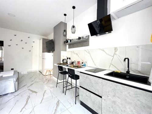 Η κουζίνα ή μικρή κουζίνα στο MURIALDO LUXURY