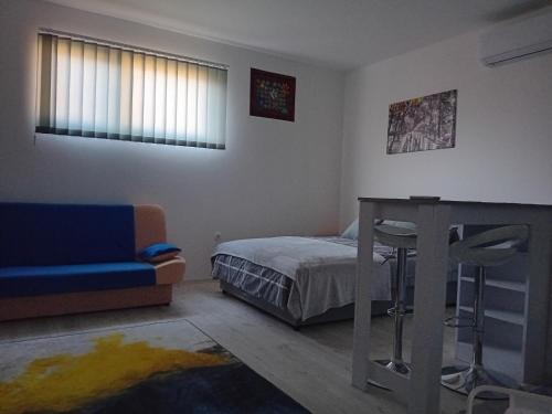 Postel nebo postele na pokoji v ubytování AlejaPark
