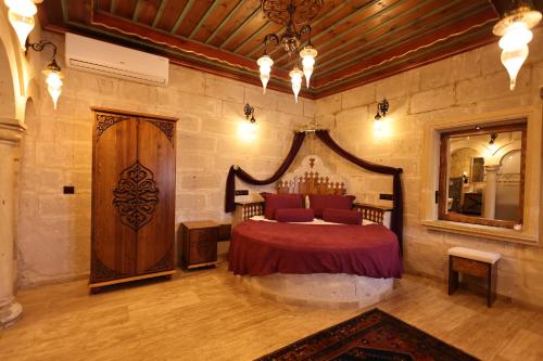 Cama o camas de una habitación en Cappadocia Inn Cave Hotel