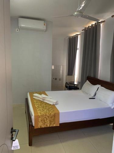 a bedroom with a large bed in a room at Raya hotel juba in Juba