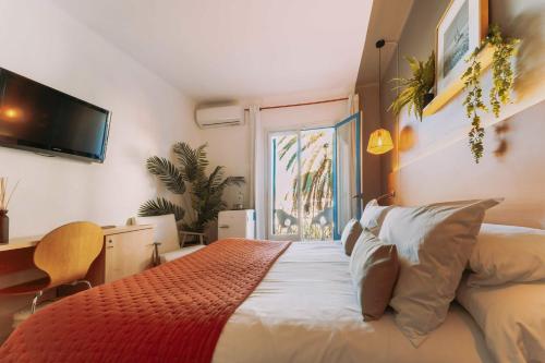 Una cama o camas en una habitación de Hotel Bell Repos