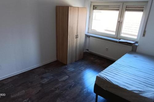 Postel nebo postele na pokoji v ubytování NEU! FeWo Skalstr. Philippsburg