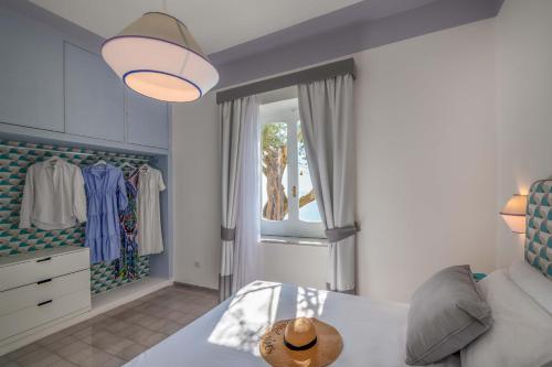 Fotografie z fotogalerie ubytování AMORE RENTALS - Villa Jacaranda v destinaci Praiano