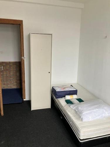 Postel nebo postele na pokoji v ubytování Expats House 10 Stabroek Belgium