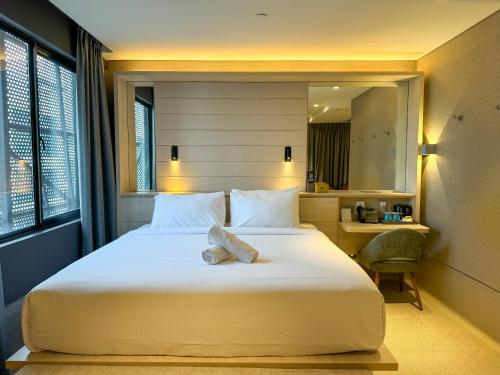 The Upper House, Batu Kawanにあるベッド