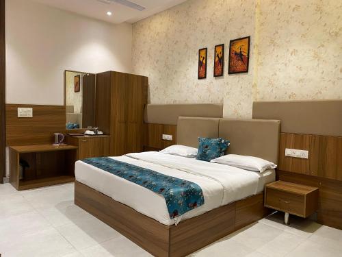 Postel nebo postele na pokoji v ubytování Era hotel
