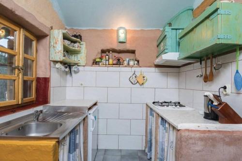 Kuchyň nebo kuchyňský kout v ubytování House Kadulja