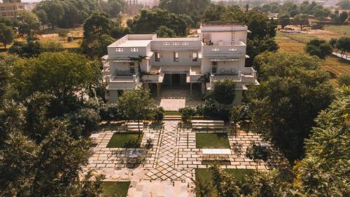 an aerial view of a house with trees at Naila Kothi - A Luxury Boutique Royal Suites in Jaipur in Jaipur