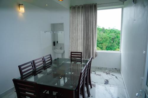 Posezení v ubytování Pinnacle Resort Vagamon