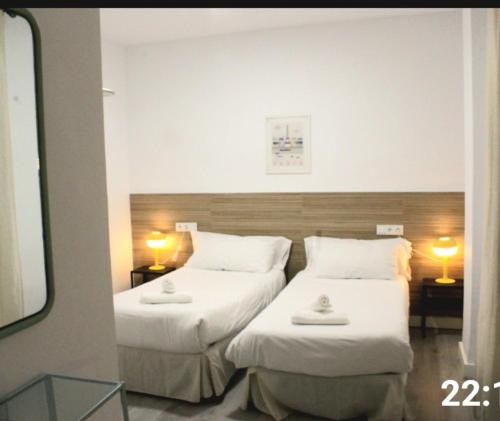Postel nebo postele na pokoji v ubytování Apartamento Abad Centro