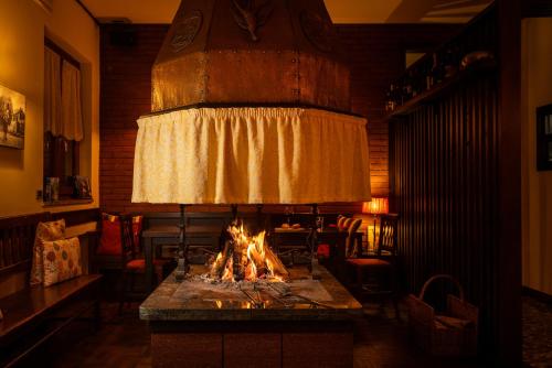 Kép Al Fogolâr Rooms & Osteria with Saunaland szállásáról Tolmezzóban a galériában
