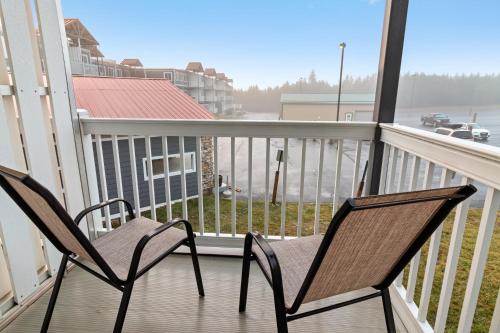 two chairs sitting on a balcony with a view at ML231 New Deck Easy Parking WiFi Next To Village in Snowshoe
