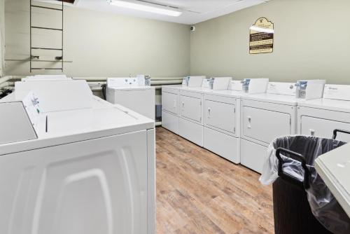 a room filled with white sinks and toilets at ML231 New Deck Easy Parking WiFi Next To Village in Snowshoe