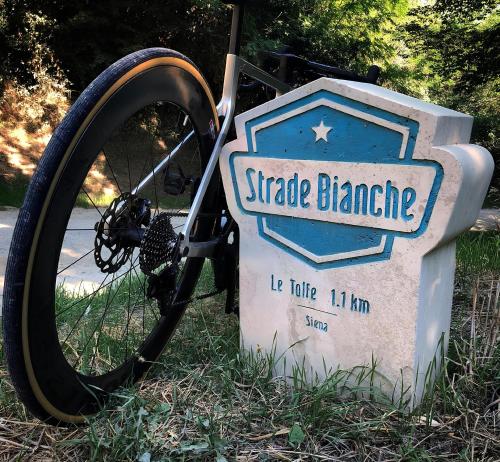 a stone sign for a garage garage dmg at CasaLeTolfe Residence in Siena