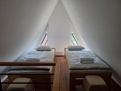 Postel nebo postele na pokoji v ubytování Vila Nada apartments
