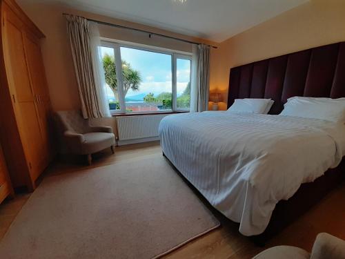 Postel nebo postele na pokoji v ubytování Edencrest B&B
