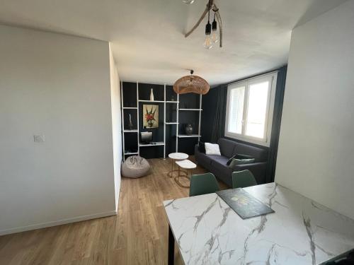Χώρος καθιστικού στο Havre de paix en appartement