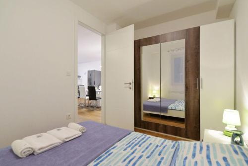 Posteľ alebo postele v izbe v ubytovaní Apartment Nata