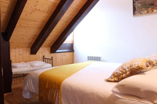 Postel nebo postele na pokoji v ubytování Misalas, Ski y montaña petfriendly - Arafita Apartamentos