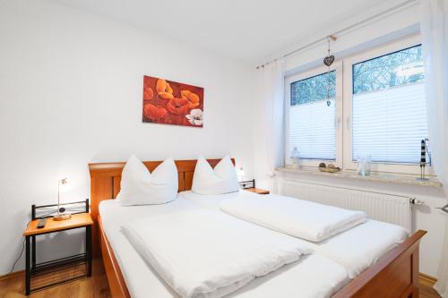 Postel nebo postele na pokoji v ubytování "Louise" Ferienwohnung Louise
