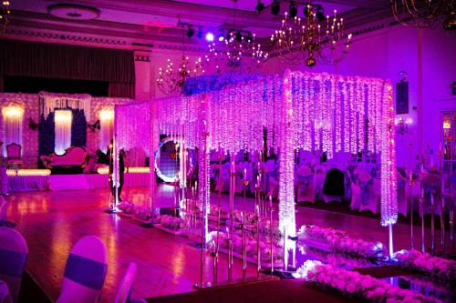 a room with a bunch of pink lights and flowers at Adelphi Hotel in Liverpool