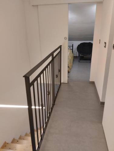 a hallway with a stairway leading to a room at Appartamento dietro il lungomare fra le due baie, fino a 8 posti letto in Sestri Levante