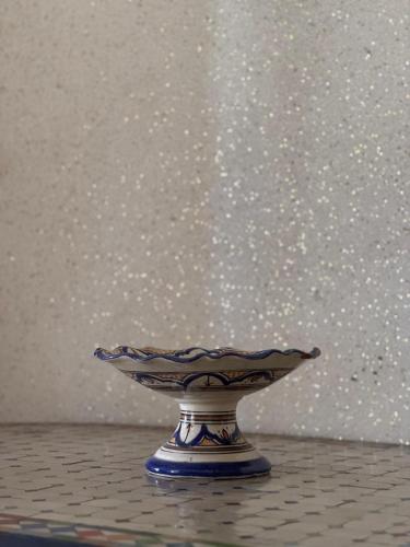 a small bowl sitting on top of a table at Dar bennis 2 in Rabat
