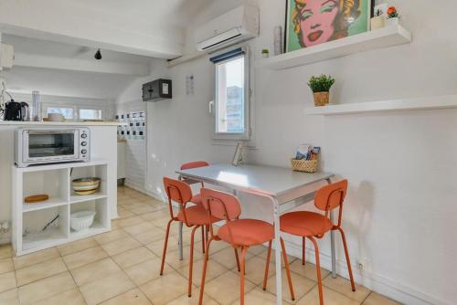 Cucina o angolo cottura di Le Grand Marseillais Terrasse vu Notre Dame