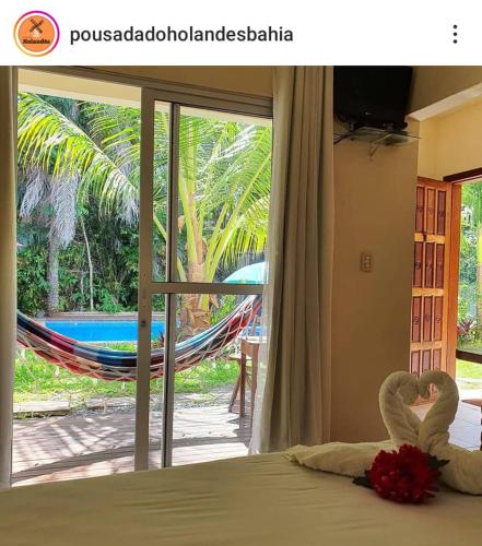 Televisyen dan/atau pusat hiburan di Pousada do Holandes Bahia