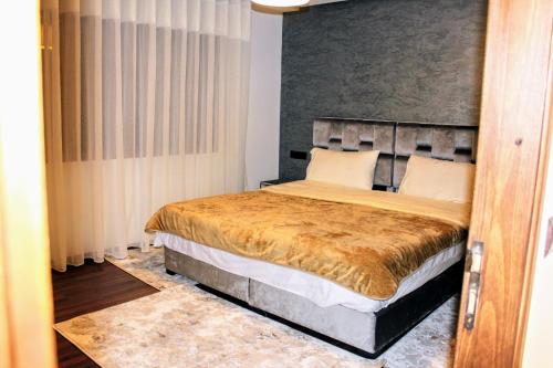 Ένα ή περισσότερα κρεβάτια σε δωμάτιο στο شقق الاسد افران