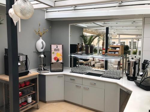 Kuchyň nebo kuchyňský kout v ubytování Villa Alba