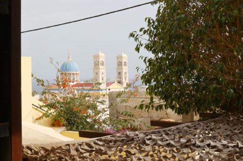 a view of the taj mahabalipuram from the roof at Efi Cozy Loft with Courtyard in Central Ermoupoli in Ermoupoli