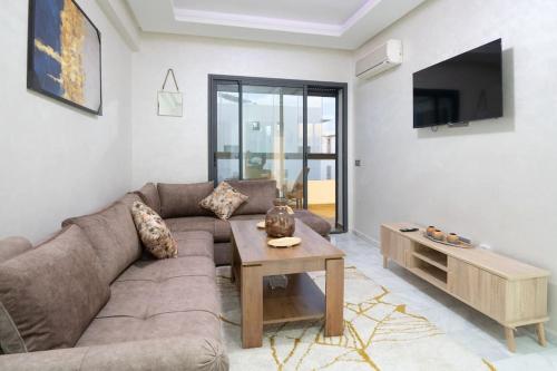 Un lugar para sentarse en Chic 2 chambres balcon vue panoramique et piscine