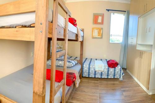 Ένα ή περισσότερα κρεβάτια σε δωμάτιο στο Casa Sauê