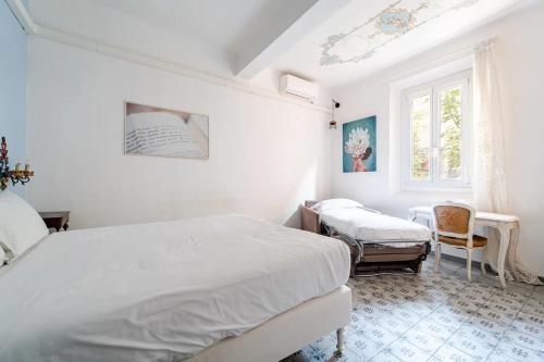 Postel nebo postele na pokoji v ubytování Oasis in the centre of Bologna