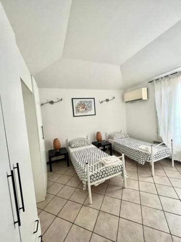 Ένα ή περισσότερα κρεβάτια σε δωμάτιο στο Residence Porta Saragozza
