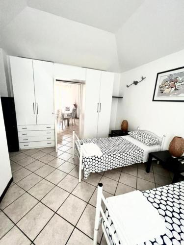 Ένα ή περισσότερα κρεβάτια σε δωμάτιο στο Residence Porta Saragozza